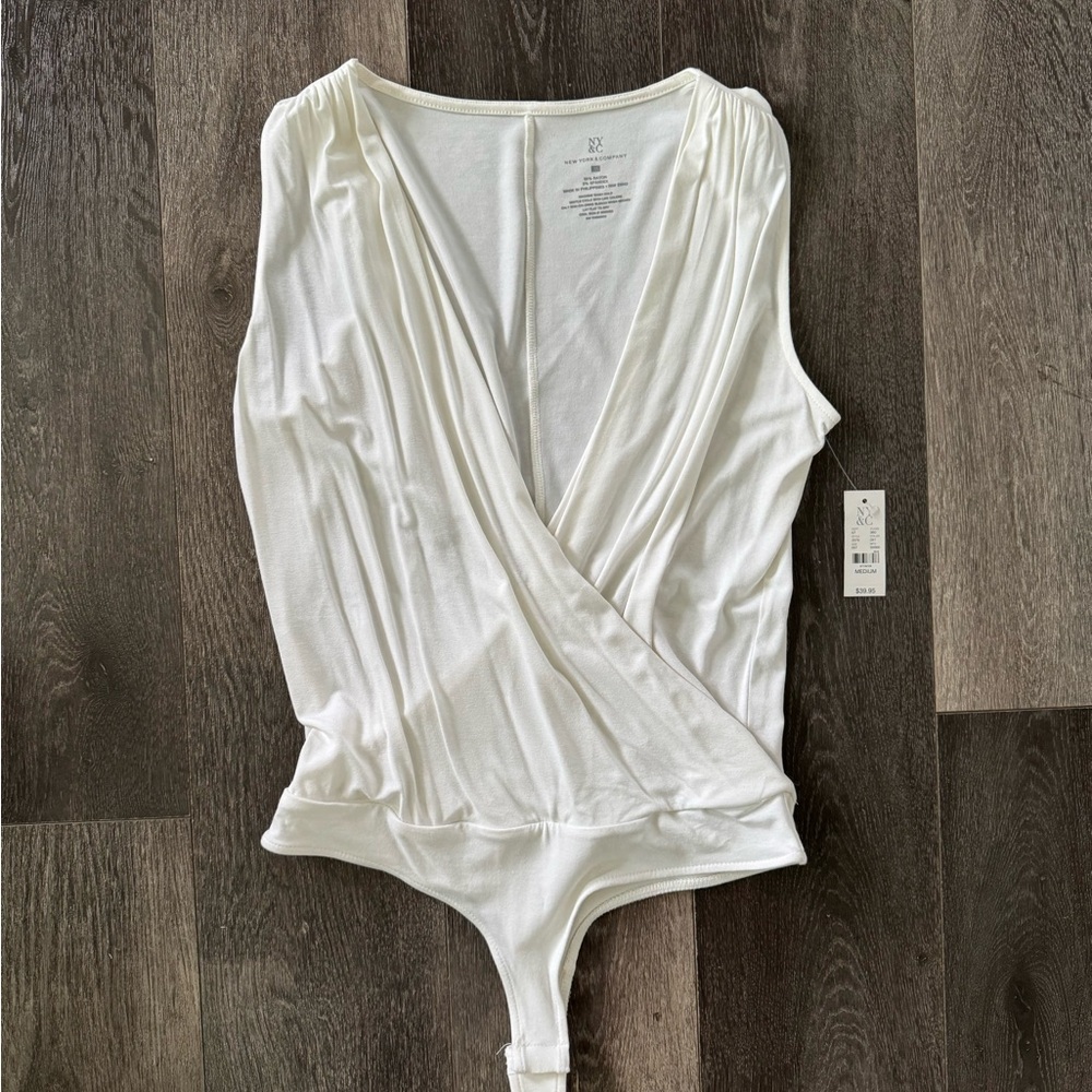 NEW NY&C White Wrap bodysuit with tags on Size M